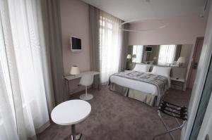 Hotels Le Cesar Hotel : photos des chambres