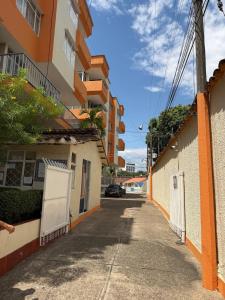 Melgar Apartment Complex with Pool and Parking