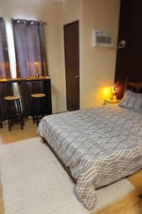 Bria Condo Mactan - Native Rattan Tropical Living