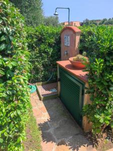Villa with garden and private equipped beach