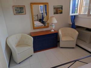 Villa with garden and private equipped beach