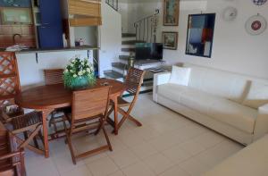 Villa with garden and private equipped beach