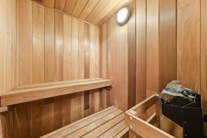 Luxury 2BR Retreat Near UBC with Sauna, Theatre & Pool Table