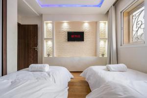2 Piscines - Salle de sport - Parking - Clim - Route de Casa