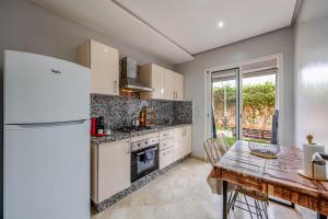 2 Piscines - Salle de sport - Parking - Clim - Route de Casa