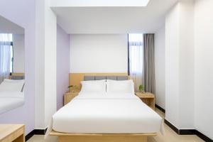 外滩之家酒店 The Bund House Hotel 近老挝国家主席府凯旋门店