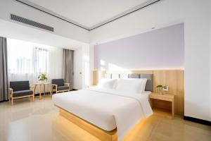 外滩之家酒店 The Bund House Hotel 近老挝国家主席府凯旋门店
