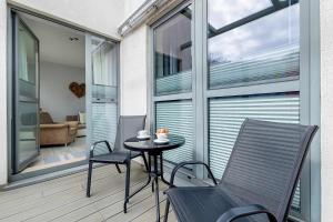 Komfortowy Apartament z Parkingiem Blisko Plaży by Noclegi Renters