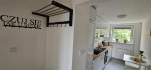 Słoneczny Apartament Panorama 5 7 z Widokiem na Jezioro i Góry