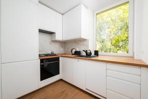 Astronautów Chopin Airport Apartment by BookingHost