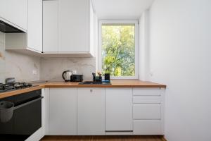 Astronautów Chopin Airport Apartment by BookingHost
