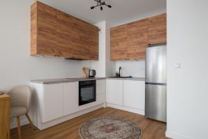 Włodkowica Cozy Apartment by BookingHost