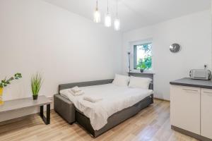 Kapliczna Comfort Apartment by BookingHost
