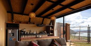 Cabin overlooking the Huaypo Lagoon in the Sacred Valley, Cusco