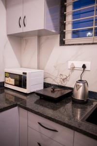 Thalassa 1BHK HSR AC, Balcony, Movie Night