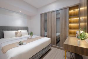 Contemporary and Spacious 1BR at Apartment Tokyo Riverside PIK 2 By Travelio
