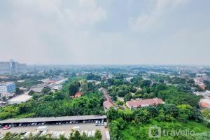 Modern Look and Comfortable 2BR Serpong Greenview Apartment By Travellio