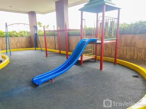 Modern Look and Comfortable 2BR Serpong Greenview Apartment By Travellio
