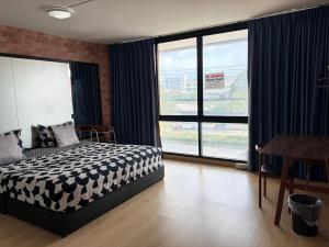 SLEEPY-Homey Don Mueang Airport Hostel
