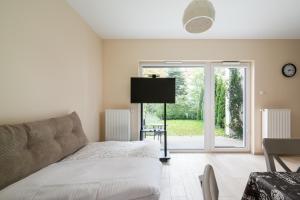Kołacińska Riverside Comfort Apartment by BookingHost