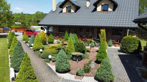 Całoroczne domki apartamentowe "Pod lipą" Izabela Konopelska