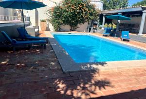 Villa Algarve Half Term offer 4 Ensuite Bedrooms, Private Swimming Pool, Beautiful Gardens with water features and natural Bio Pool