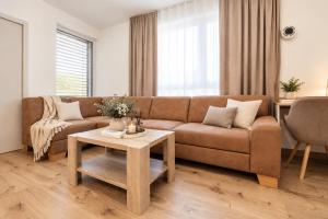 ALURE RESIDENCES 9 & 24h self check-in, private parking in front of the apartment building included, new building, terrace, the apartment building has its own park with a lake and outdoor fitness, childrens playground, CITY CENTER