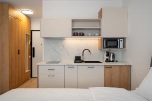 Alpha Hub Apartments