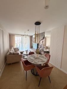 GLEJZER- APARTAMENTY Apartament Plażowy C011 Posesja plażowa-Prywatny apartament