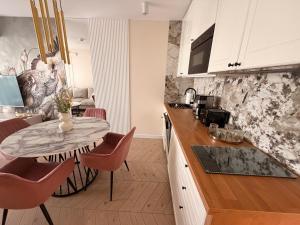 GLEJZER- APARTAMENTY Apartament Plażowy C011 Posesja plażowa-Prywatny apartament