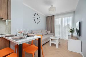 Cozy Apartment with Parking & Balcony by Noclegi Renters