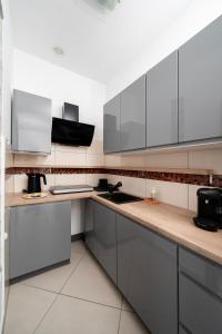Stawy Jana Standard Apartment by BookingHost