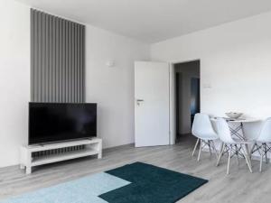 Quadratum Apartment by Noclegi Renters