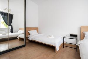 Piaseczna Homely Apartment by BookingHost
