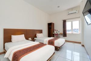 Crown Inn City Center Makassar