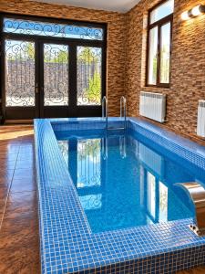 Green villa panorama heated inside pool and sauna