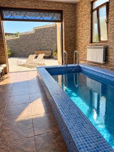 Green villa panorama heated inside pool and sauna