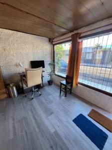 A bright little house in a central location with a wood-burning stove