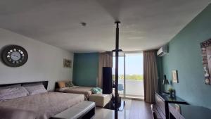 Suite en resort playa blanca wifi, playa y piscina