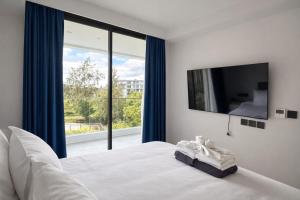 2BR Layan Beach Apartment Capital Pro
