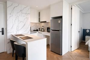 2BR Layan Beach Apartment Capital Pro