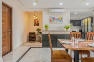 ELIVAAS Signature Aura Sky Urban 3 BHK Apartment With Hill View, Private Terrace Sit-Out, Bar Corner & Shared Gym