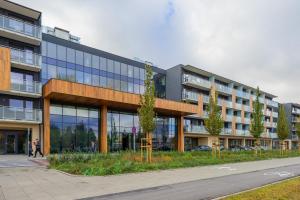 Pileckiego Apartments with Parking & Balcony by Noclegi Renters