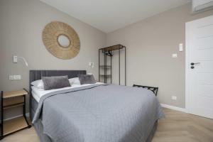Pileckiego Apartments with Parking & Balcony by Noclegi Renters