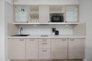 Pileckiego Apartments with Parking & Balcony by Noclegi Renters