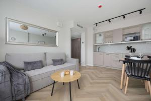 Pileckiego Apartments with Parking & Balcony by Noclegi Renters