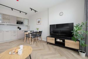 Pileckiego Apartments with Parking & Balcony by Noclegi Renters