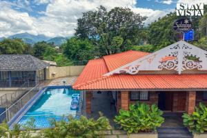 StayVistas Solmira Haven - 4BHK Villa with Infinity Pool & Sports Turf