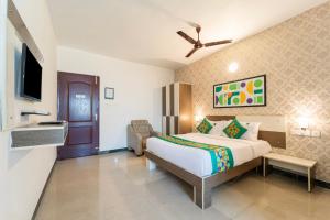 Treebo AVM Comfort Inn Near Gandhipuram Bus Stand