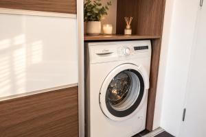 ALURE RESIDENCES 14 & 24h self check-in, private parking in front of the apartment building included, new building, CITY CENTER